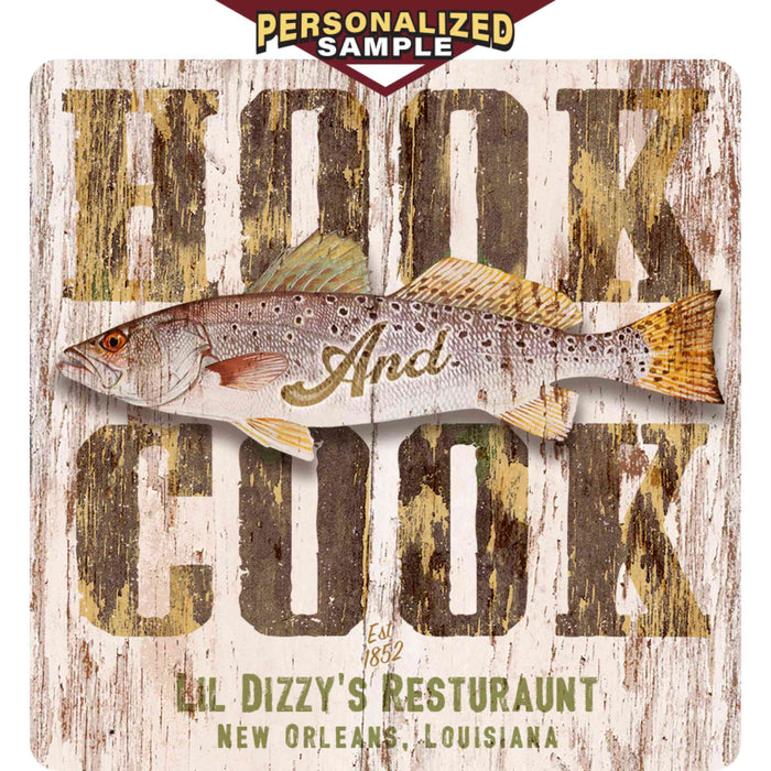 Personalized example of Sunshine Corner's customizable, fly fishing camp and trout decor that says, "Hook and Cook - Lil Dizzy's Restaurant " - New Orleans, Louisiana - est. 1852.