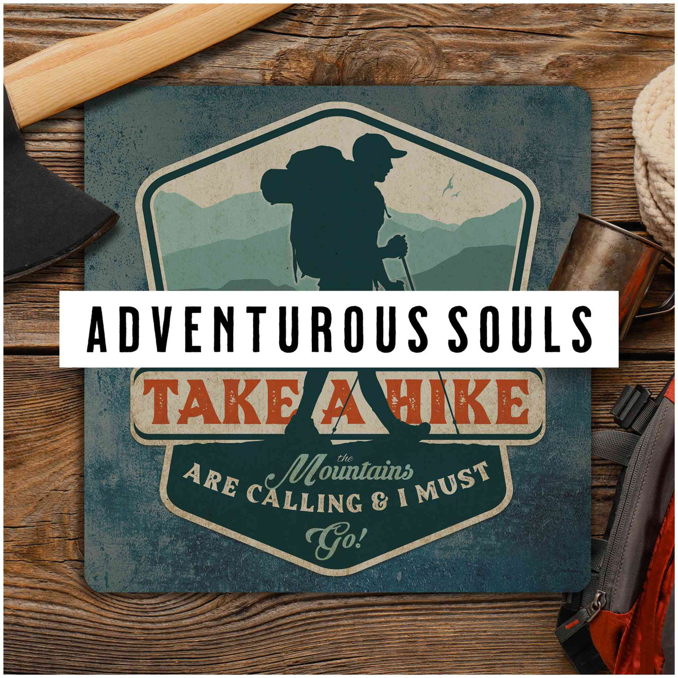 One of Sunshine Corner's Adventurous Souls Signs, "Take A Hike" with a banner labeled "Adventurous Souls" on the top with a dark overlay.