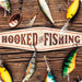 Sunshine Corner's customizable, fish camp decor that says, "Hooked on fishing".