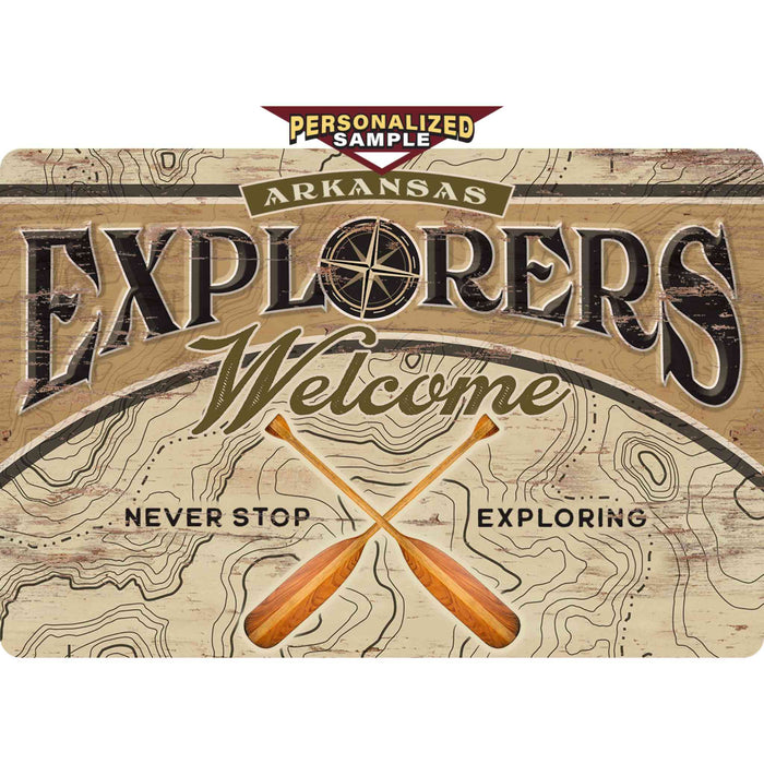 Personalized example of Sunshine Corner's customizable, kayaking sign and adventure decor that says, "Arkansas Explorers Welcome - Never Stop Exploring".