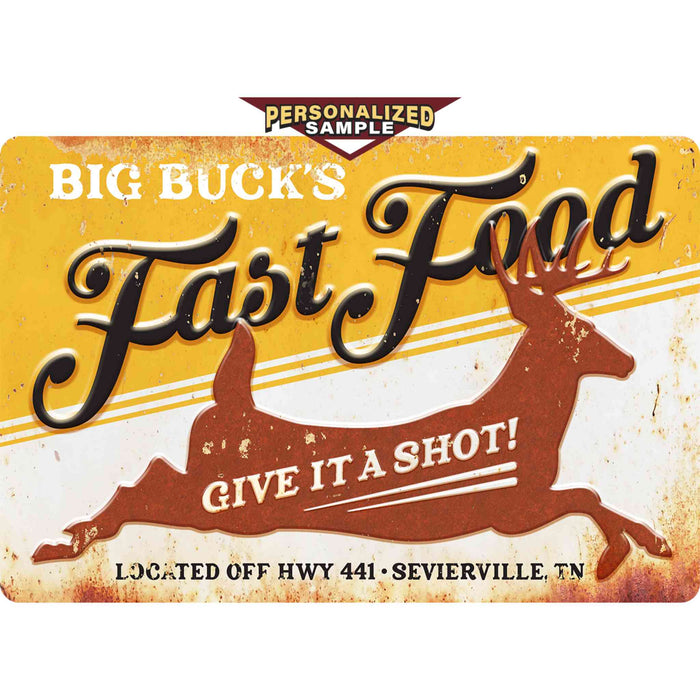 Personalized example of Sunshine Corner's customizable, hunt camp and deer decor that says, "Big Bucks fast food - give it a shot - located off hwy 441 - sevierville, tn".